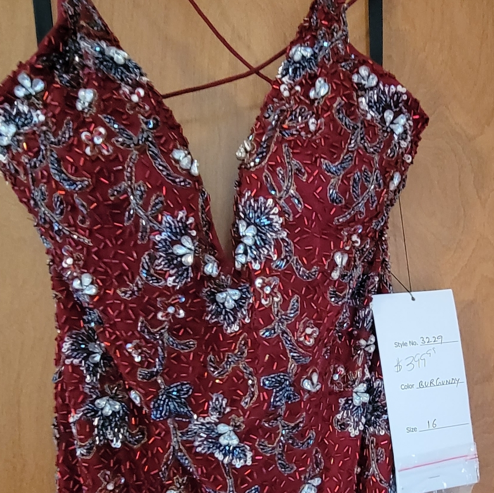 New with tags Primavera prom/pageant dress. Sz16 burgundy